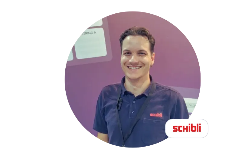 A smiling man in a Schibli polo shirt, next to the Schibli logo